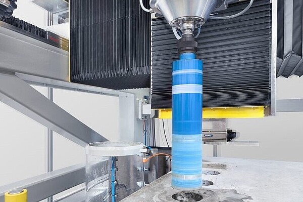 Test system for function and load testing of drill bits for construction drilling machines
